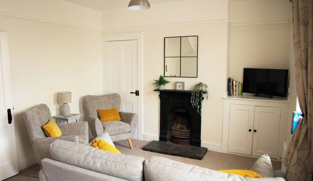 An original Coastguard’s Cottage with private access to the beach.