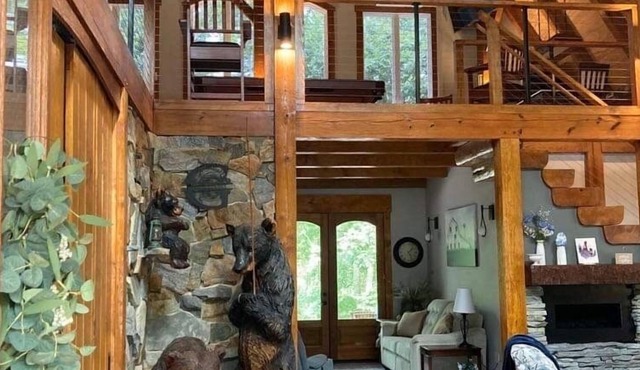 An owner-built custom timber, pegged barn-like home made ala’ Amish style!