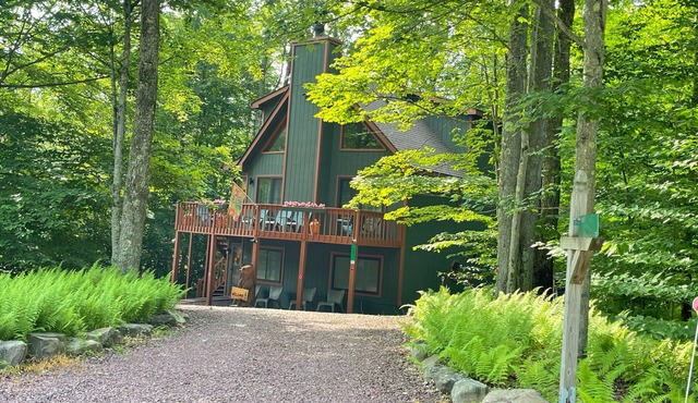 An Ultimate Pocono Lake Retreat Awaits,3 Level home with 4 Bdr, 5 beds & 3 Baths