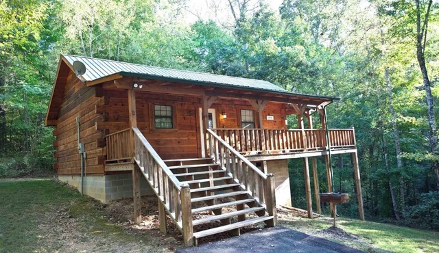 Angler cabin. This modern private studio Cabin with HOT TUB is tucked away in a wooded cove.