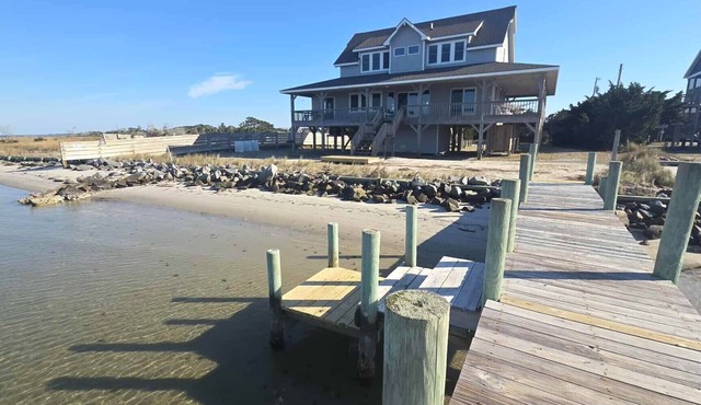 Anticipation: Private dock, wrap around deck, expansive sound views.