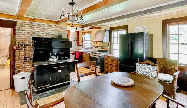 Antique dog-friendly farmhouse with private sauna, washer/dryer, grill, and AC
