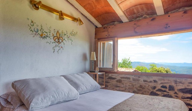 Apartamento duplex rural con chimenea y vistas panorámicas desde la cama