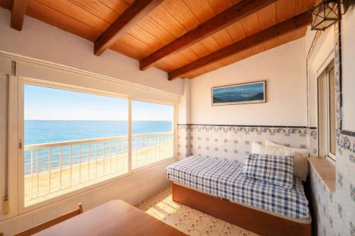 Apartamento en primera línea de playa con vistas al mar
