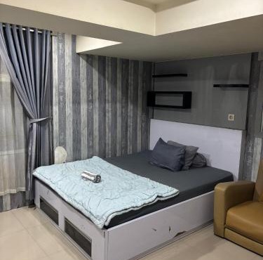 apartemen jardin cihamplas byParty Room