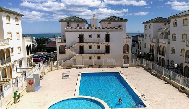 Apartment Casa Cozy with Sea View, Pool, Wi-Fi, A/C & Terrace
