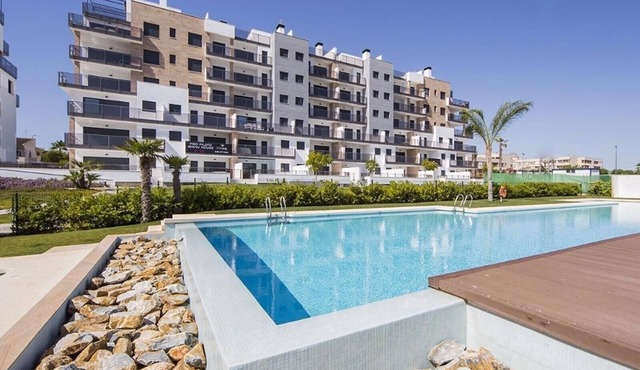 Apartment in Mil Palmeras with Sea View, Pool, Garden, Terrace, A/C & Wi-Fi