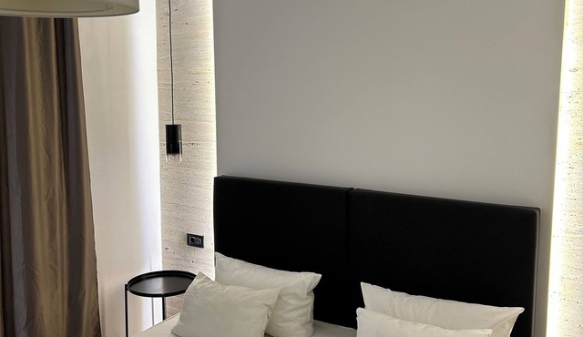 Apartment for 4 people with whirlpool and a large garden