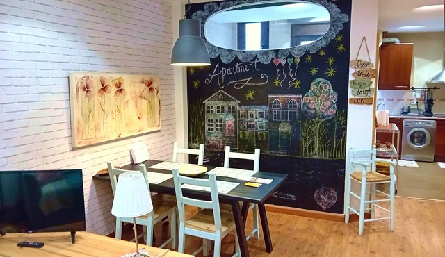 Apartment in center with free private parking.