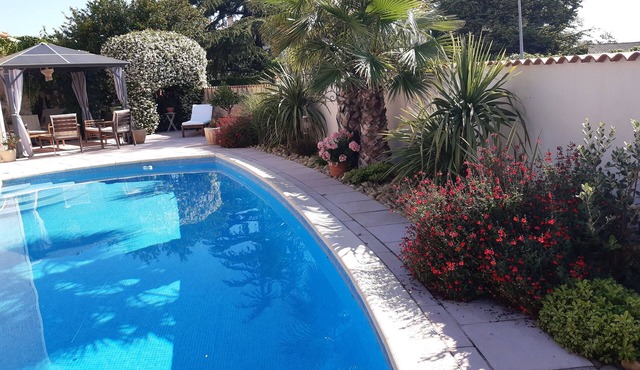 Apartment in villa with private pool and garden