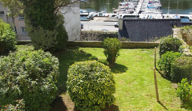 apartment overlooking garden and sailboats