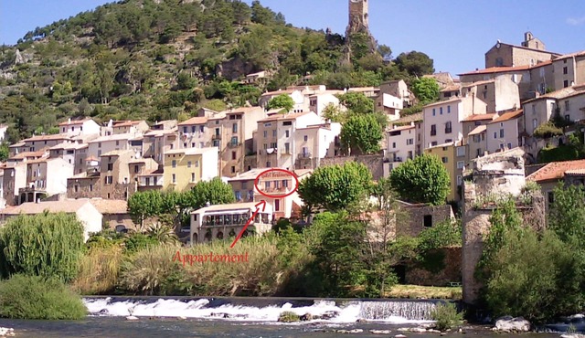 Apartment rental overlooking the river in the heart of the village of Roquebrun