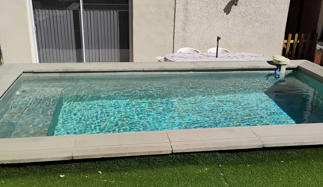 Apartment T1 28m2 on the ground floor of our home with garden and shared pool.