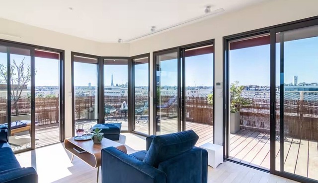 Apartment with large terrace facing the Eiffel Tower. One of a kind!