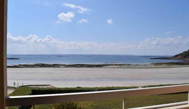Apartment with 2 bedrooms, balcony, and stunning sea view steps from Tresmeur beach