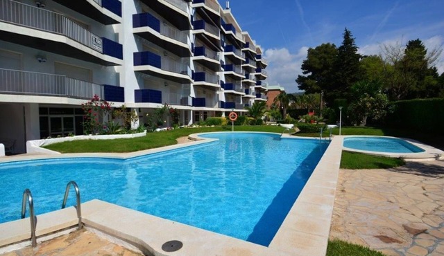 Apartment with communal pool and playground