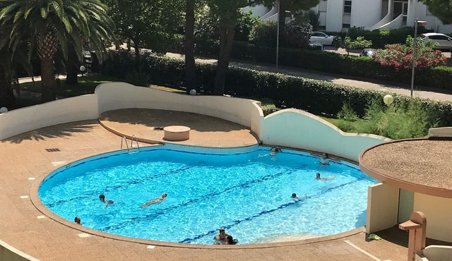 Apartment with swimming pool - garage - air conditioning. - beach 200m away - WIFI