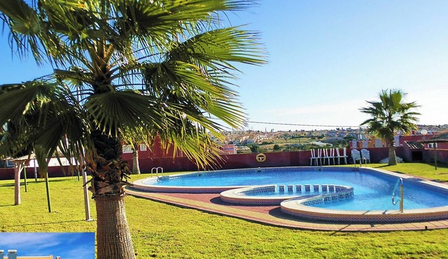 Apartment with Large Roof Solarium, Pool, Garden, Barbecue, A/C & Wi-Fi