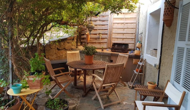 Apartment with terrace in the heart of a Corsican village 10 minutes from the beach