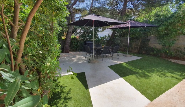 Apartment with Terrace andGrill in the Garden