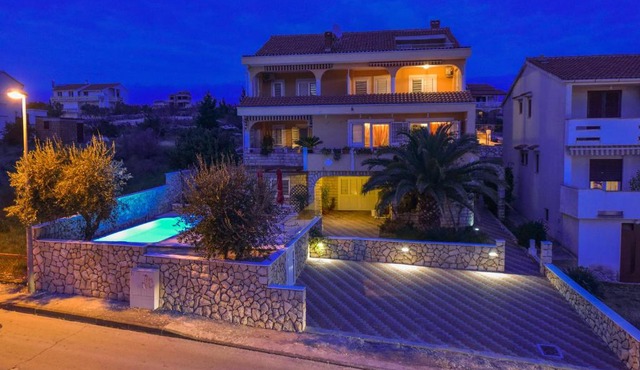 Apartments and rooms with a swimming pool Novalja, Pag - 9334