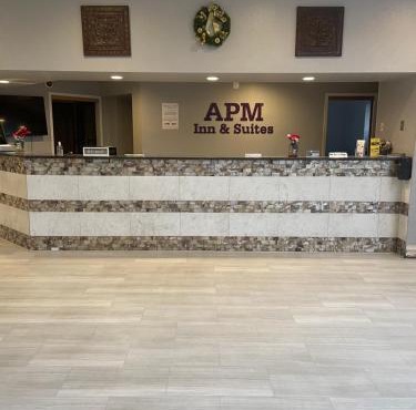 Apm Inn & Suites