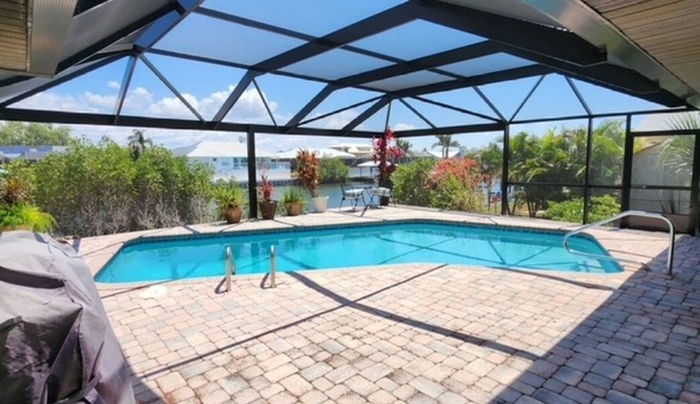 Apollo Beach Waterfront 3BR — Private Dock, Heated Saltwater Pool & Kayaks