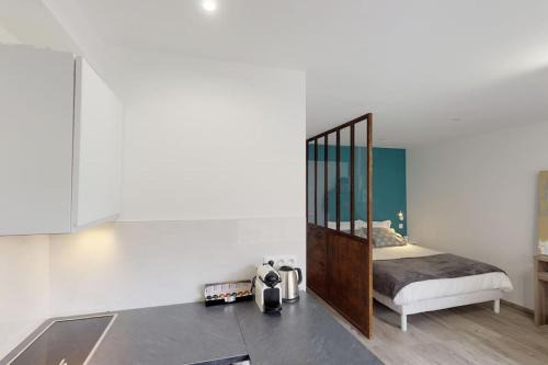 Appart 3 pers piscine parking coeur de ville