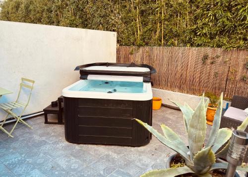Appartement élégant avec jacuzzi privé