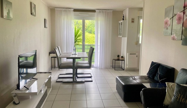 Appartement au calme dans un espace vert, proximité centre ville