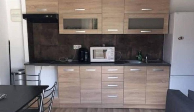 Appartement Chez L'hôte, à Proximité du Futuroscope