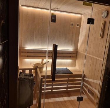 Appartement cosy de plein pied avec sauna, jardin et parking privé - proche gare et commerces