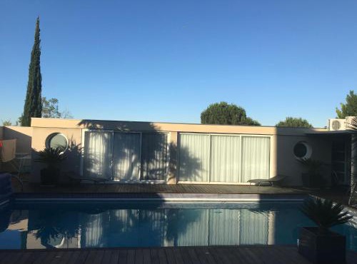 Appartement cosy avec piscine partagée