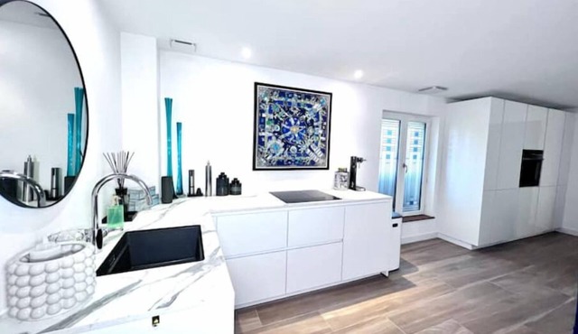 Appartement de 70m2 Avec Balnéo, Clim, Terrasse, et Parking Sous Terrain