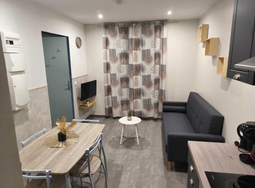 Appartement RDC avec parking au centre-ville