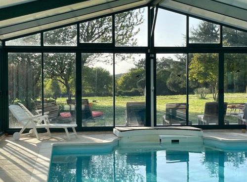 Appartement premium dans propriété avec parc et piscine chauffée privée