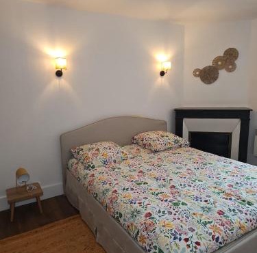 Appartement Refait a neuf avec accès au jardin , local vélo