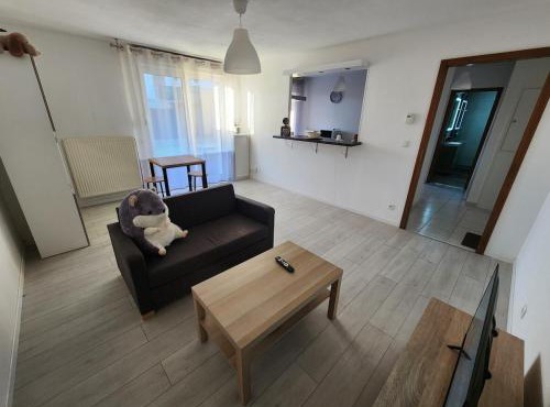 Appartement rez-de-jardin avec terrasse privative