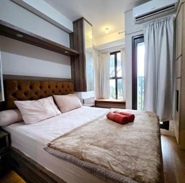Apt Transpark Bintaro Studio with Pool by Damaresa