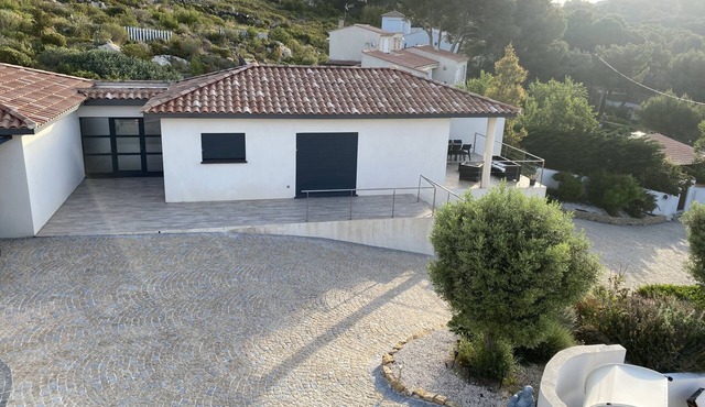 architect-designed villa on private estate. Swimming pool open with dates and times.