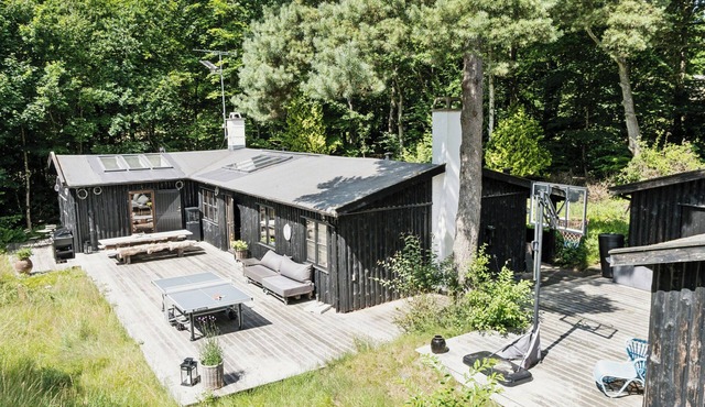Architect designed with two wings by Tisvilde Hegn