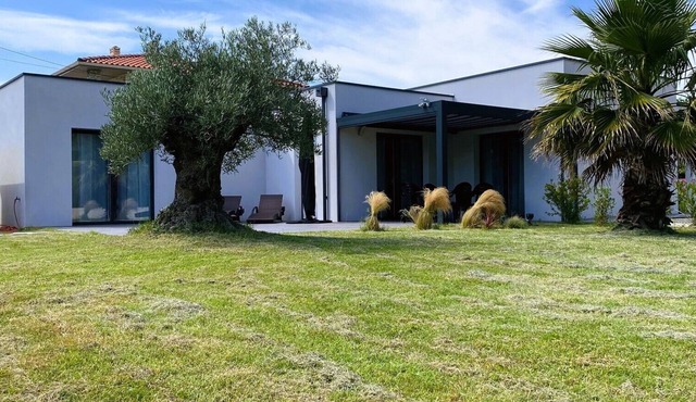 Architect-designed villa just a few minutes' walk from Nauzan beach.