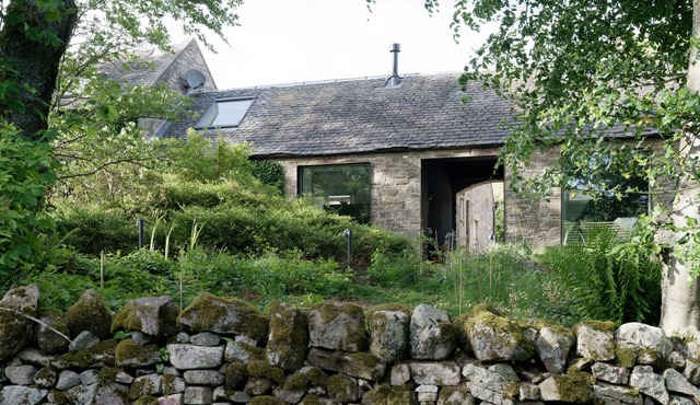 Architect designed hilltop hideaway near Edinburgh with wood-fired sauna.