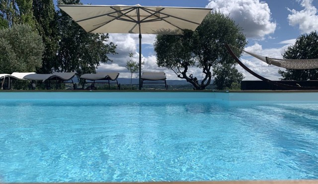 Architect-designed house set in 2 hectares of grounds with heated pool and spa