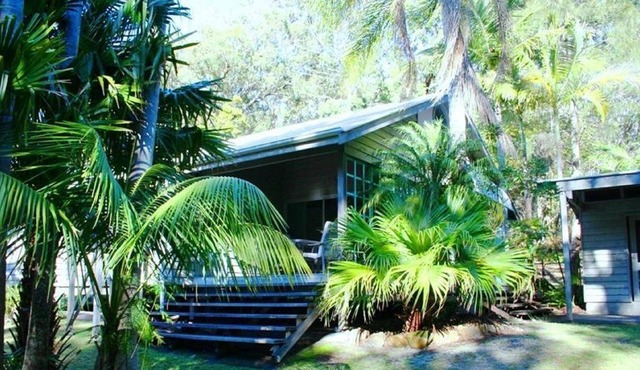 Architecturally designed beach house with a private covered north facing...