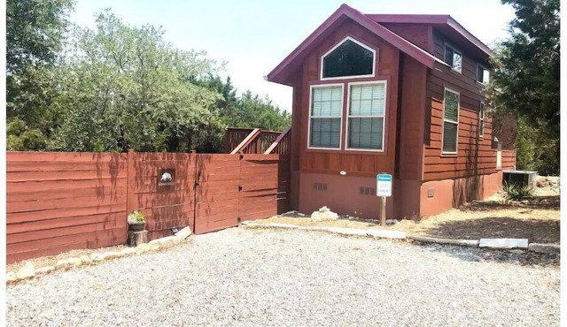 Armadillo cabin in a boutique gated tiny home resort with pool!