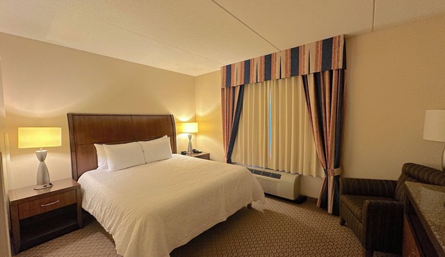Arnot Grand Hotel & Suites