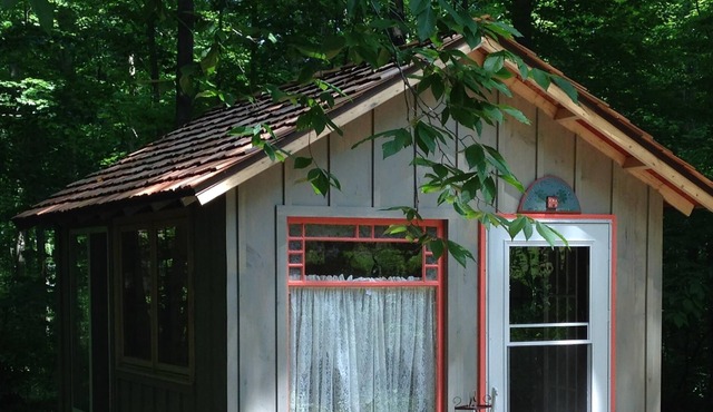 Artist cabin overlooks the pond. A peaceful setting.