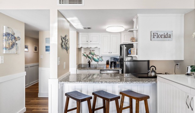 Artistic Coastal themed Beachfront condo with incredible VIEWS! (712)