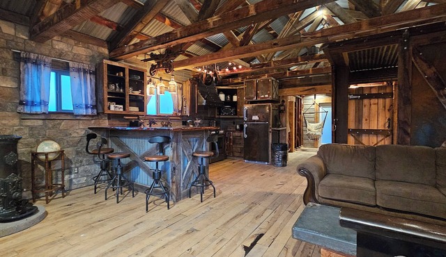 Artistry barn where the building is a work of reclaimed art with amazing views